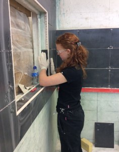 Week 2 where Rebecca was Tiling around a window. 