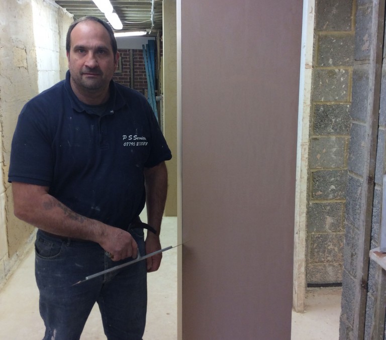Father and Son on the plastering courses!