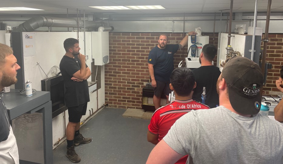 Group of Able Skill Students and an instructor in the Gas Workshop