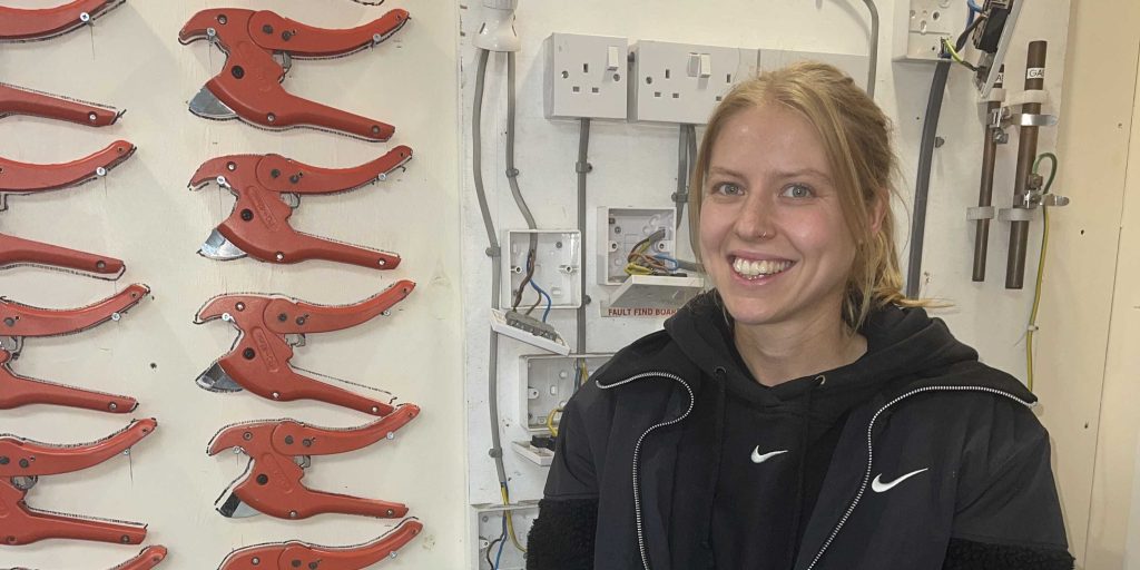 Able Skills Student Kirstie in the electrical workshop