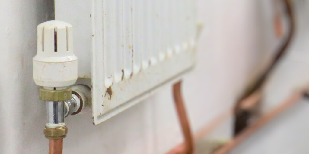 Radiator with valve and copper pipes