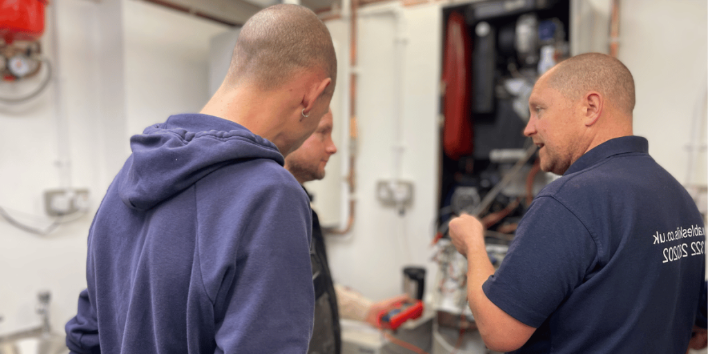 Able Skills instructor and two students on the Boiler Fault Finding Course