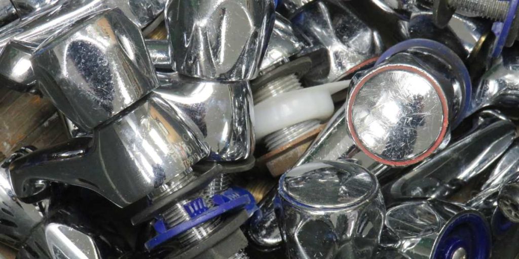 Silver hot and cold water taps